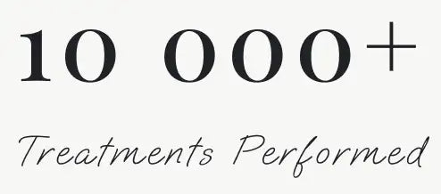 Black serif font text reading ’10 000+’ above cursive script ’treatments performed’ on a light background.