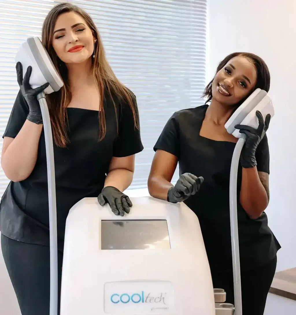 White cooltech body contouring device with sleek, modern design and a digital display panel.